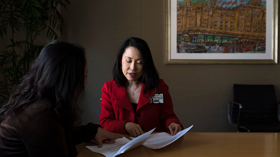 Social Worker Akiko Miyake with a Patient