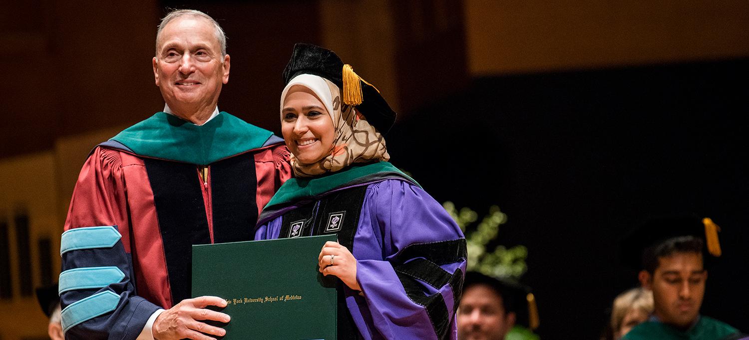 Dean Grossman with a Student at Graduation 