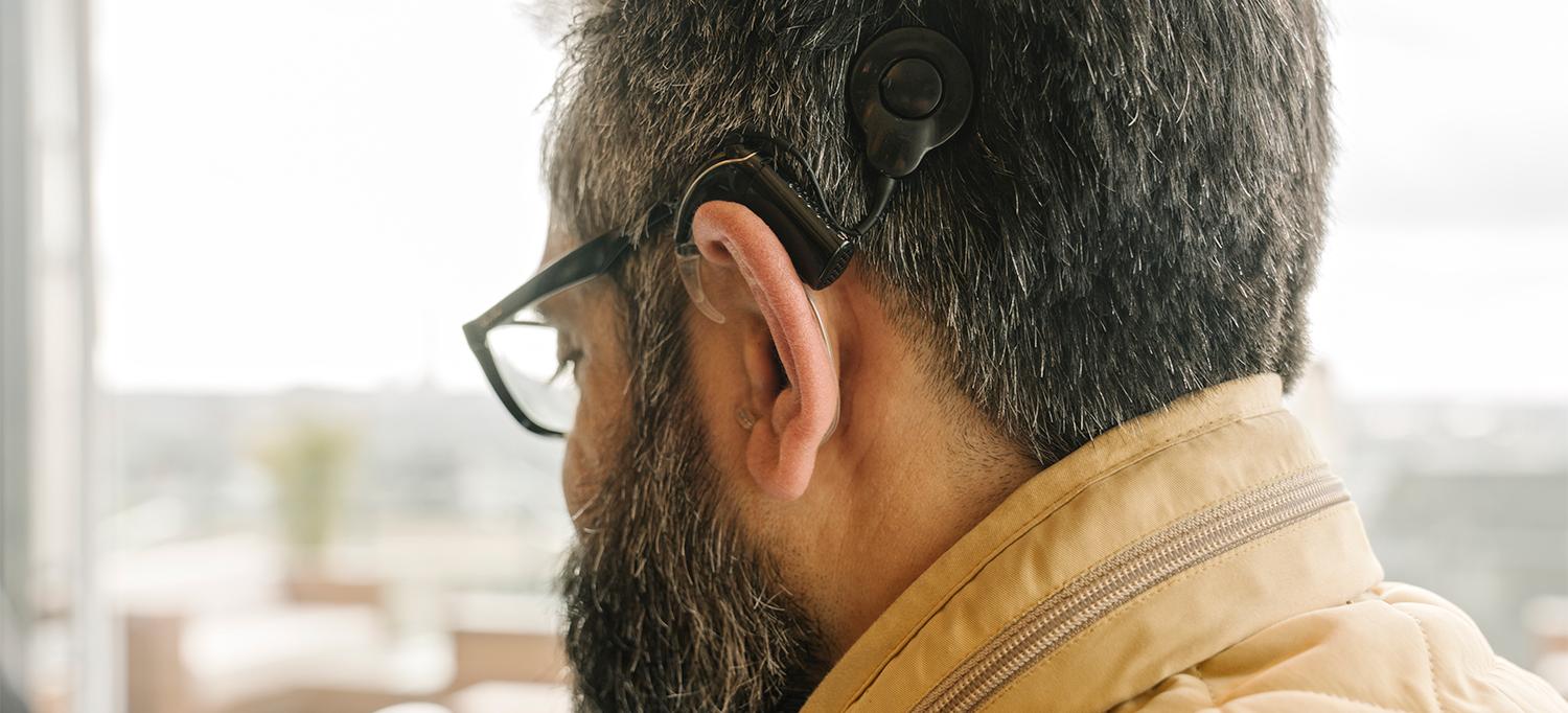 Person with Cochlear Implant on Left Ear
