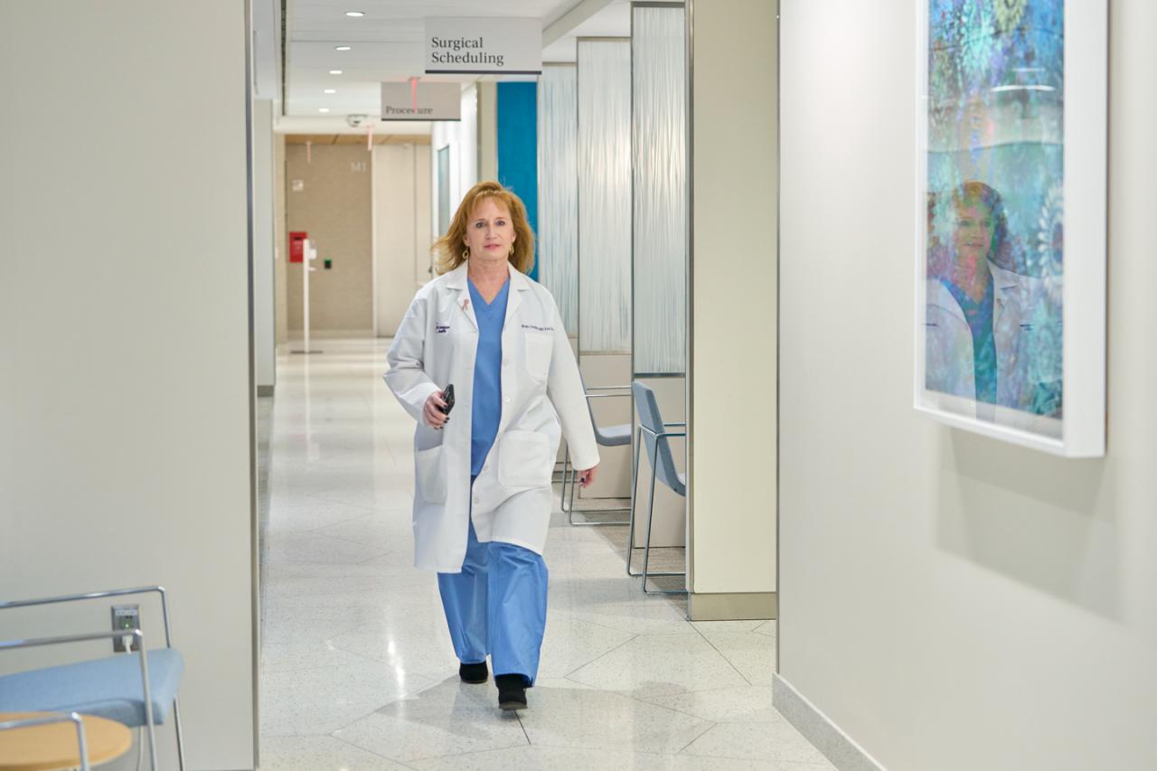  Dr. Ruth Tessler Walks Down Hallway at NYU Langone Ambulatory Care Center East 53rd Street