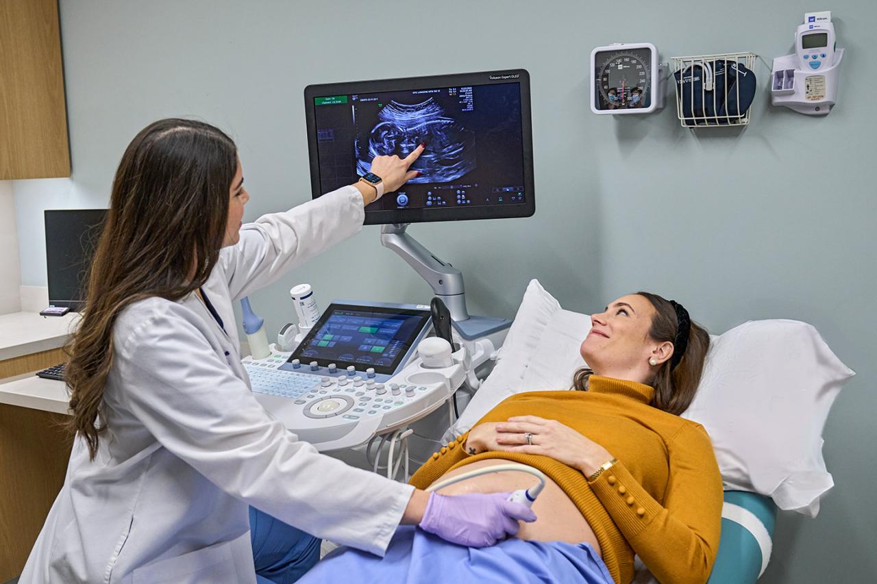 Pregnant Patient Receives Ultrasound Exam from Practitioner