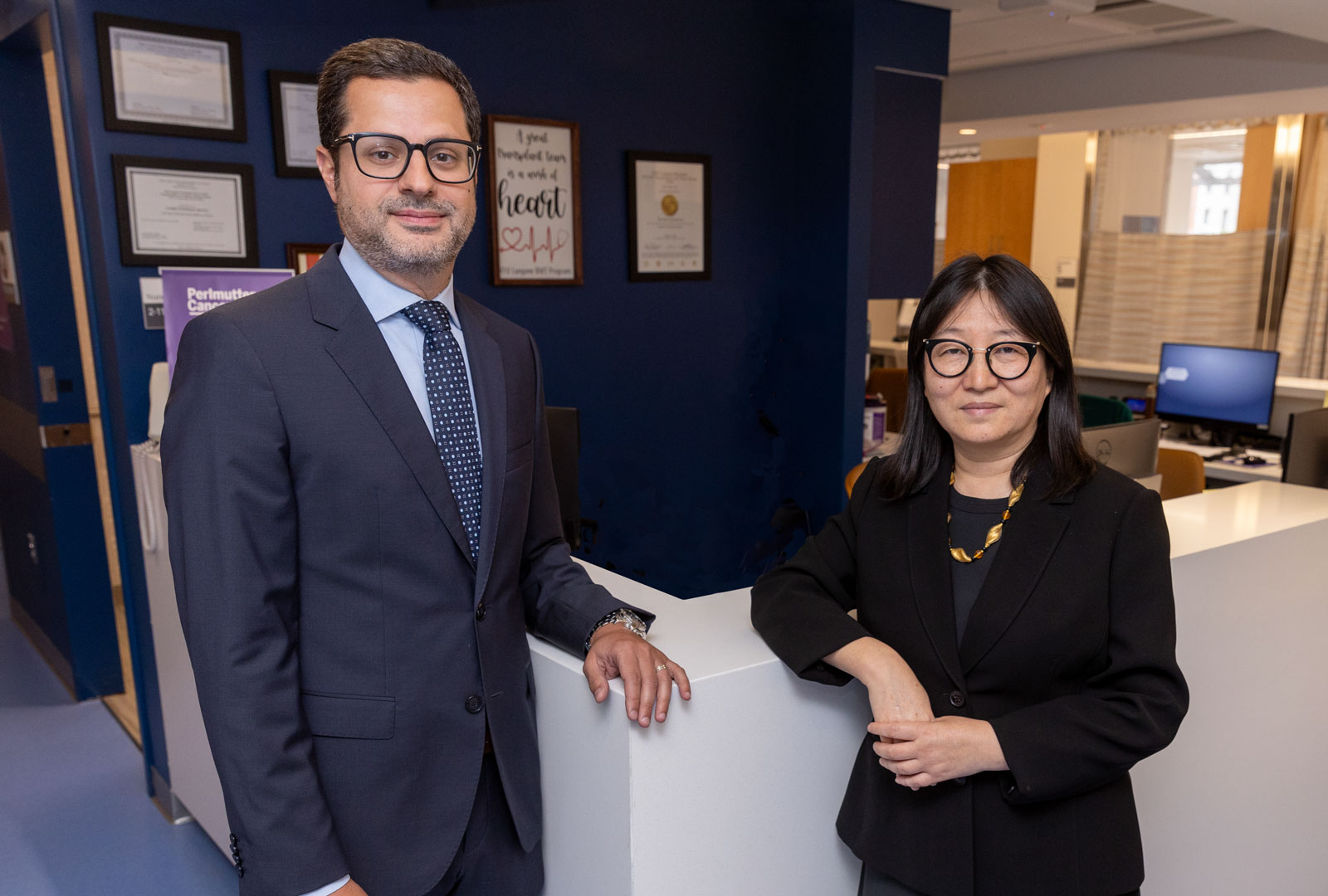 Dr. Mohammad Maher Abdul Hay and Dr. Jingmei Hsu stand together in a clinical office setting.