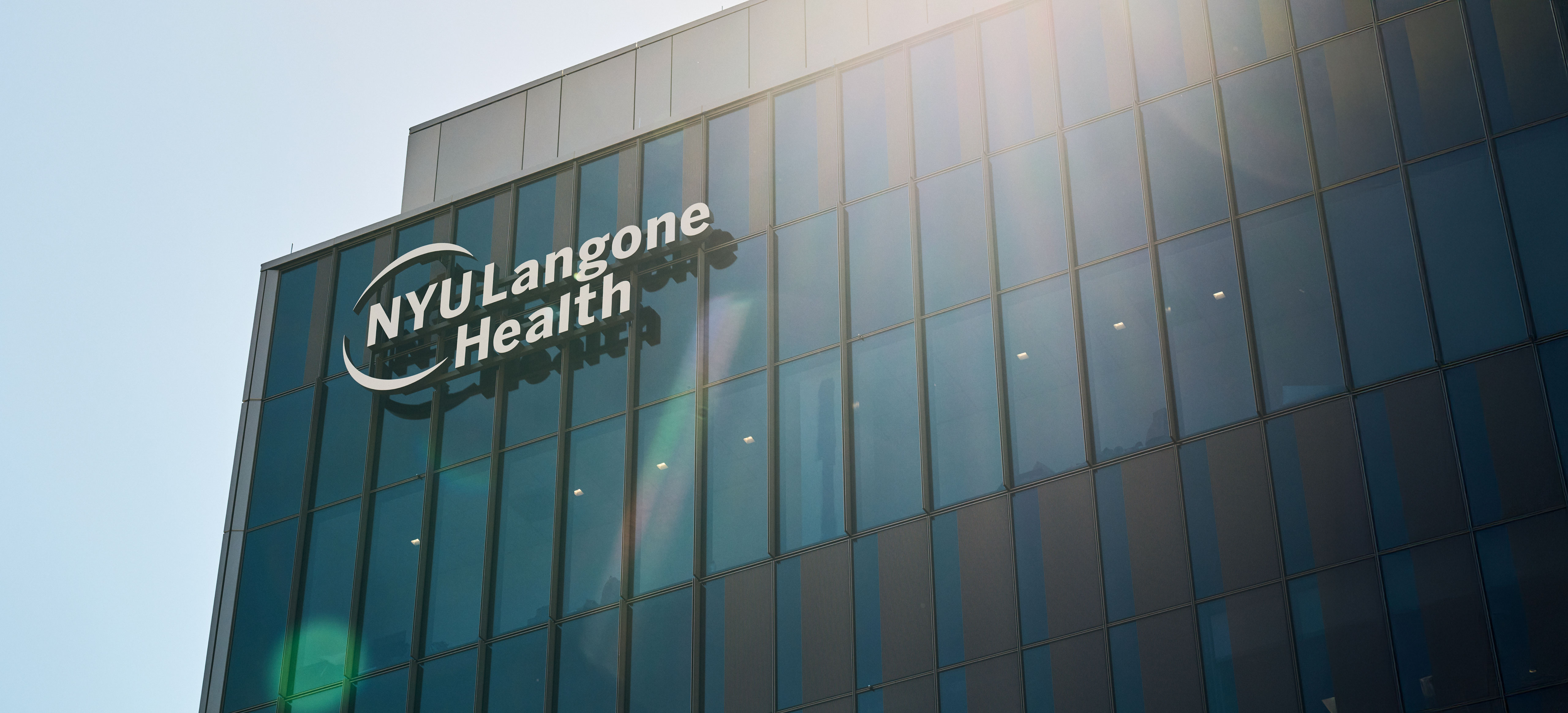 Dr. Shilpi Mehta-Lee speaking with a patient in an exam room.