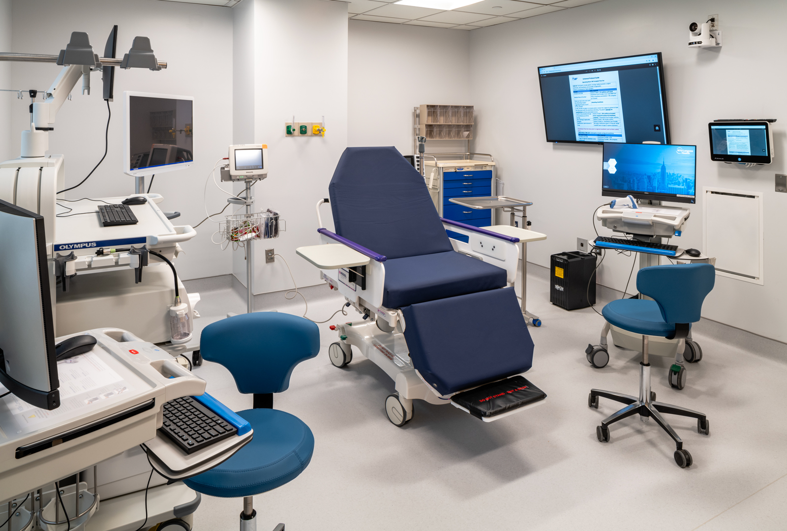 Endoscopy room with chair for patient and various technology