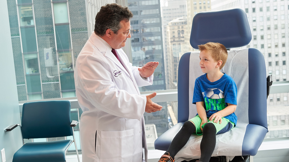 Dr. David A. Staffenberg with Pediatric Patient