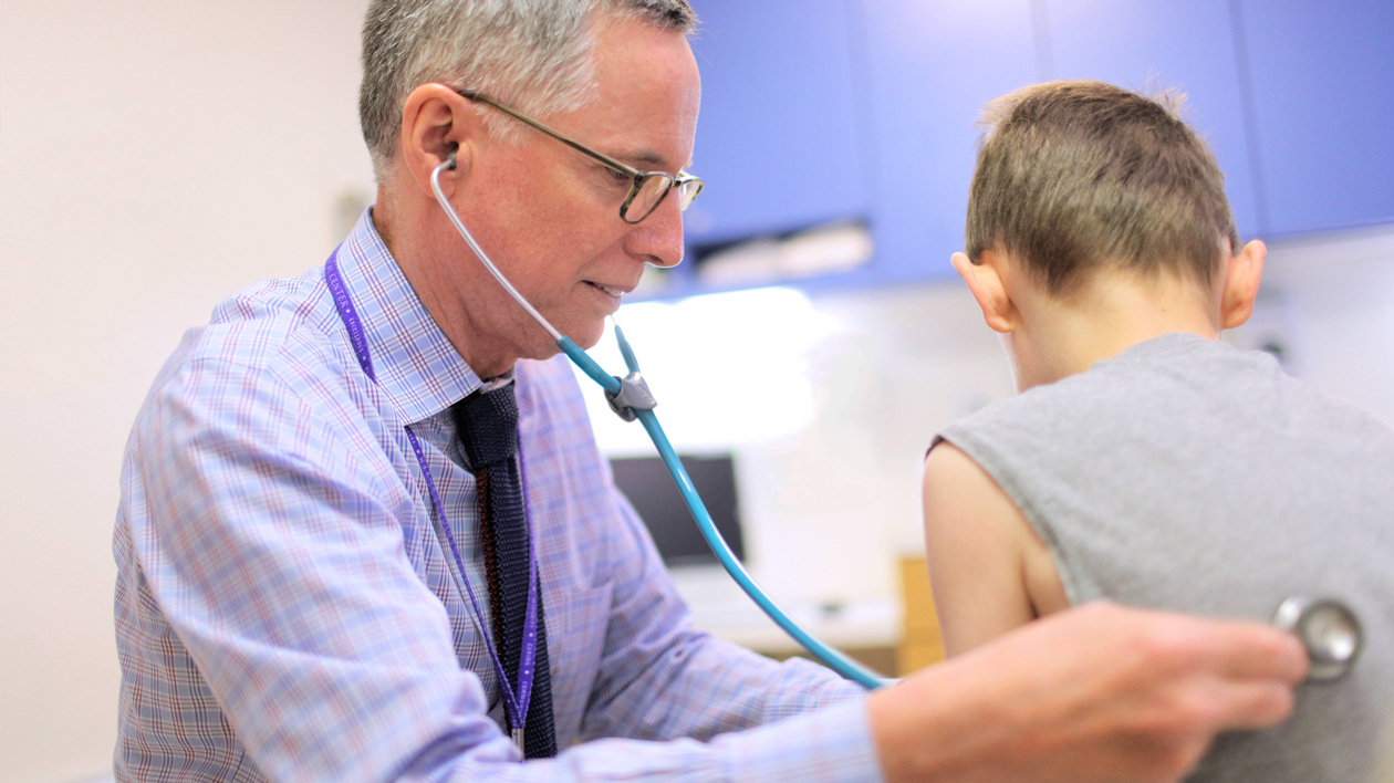 Doctor Examines Pediatric Patient