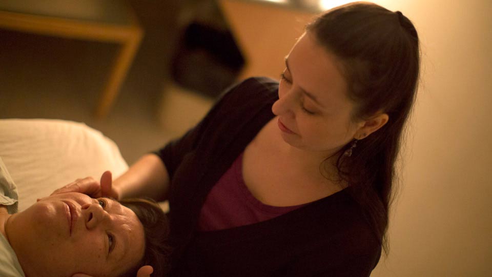 Specialist Gives Patient Head Massage