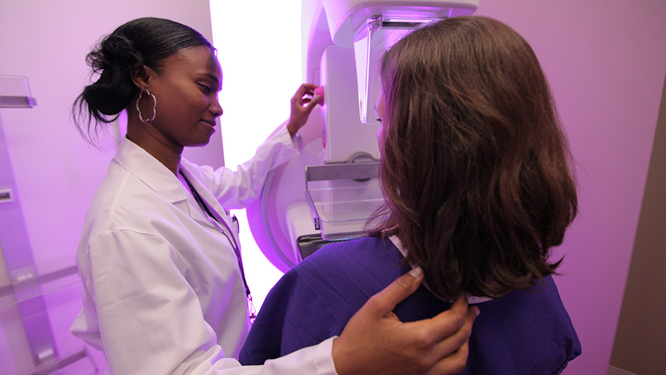 Technologist Teisha David-Blanchette Administers Mammogram