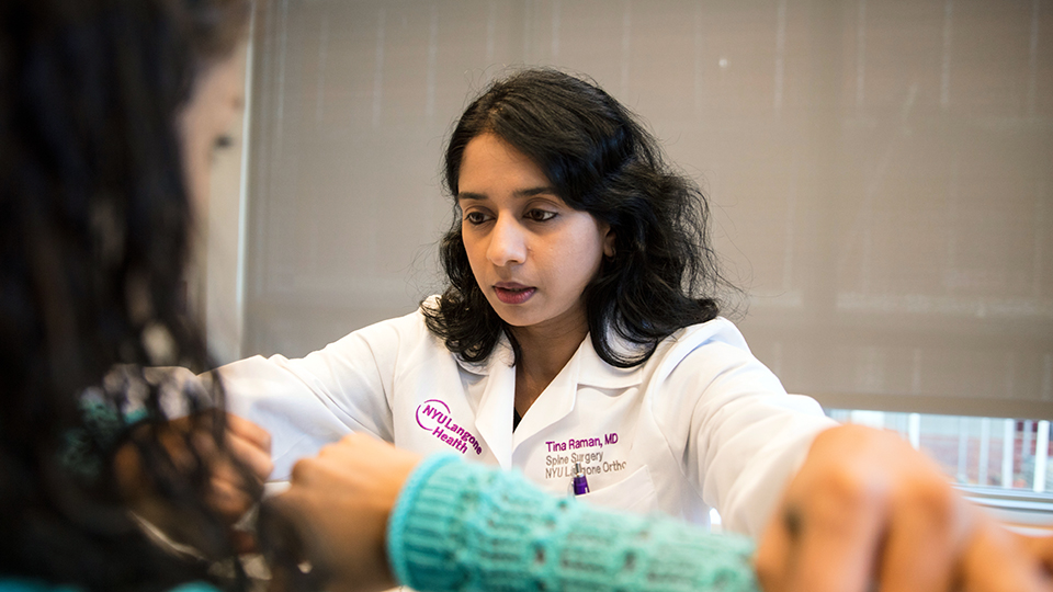 Dr. Tina Raman with Patient