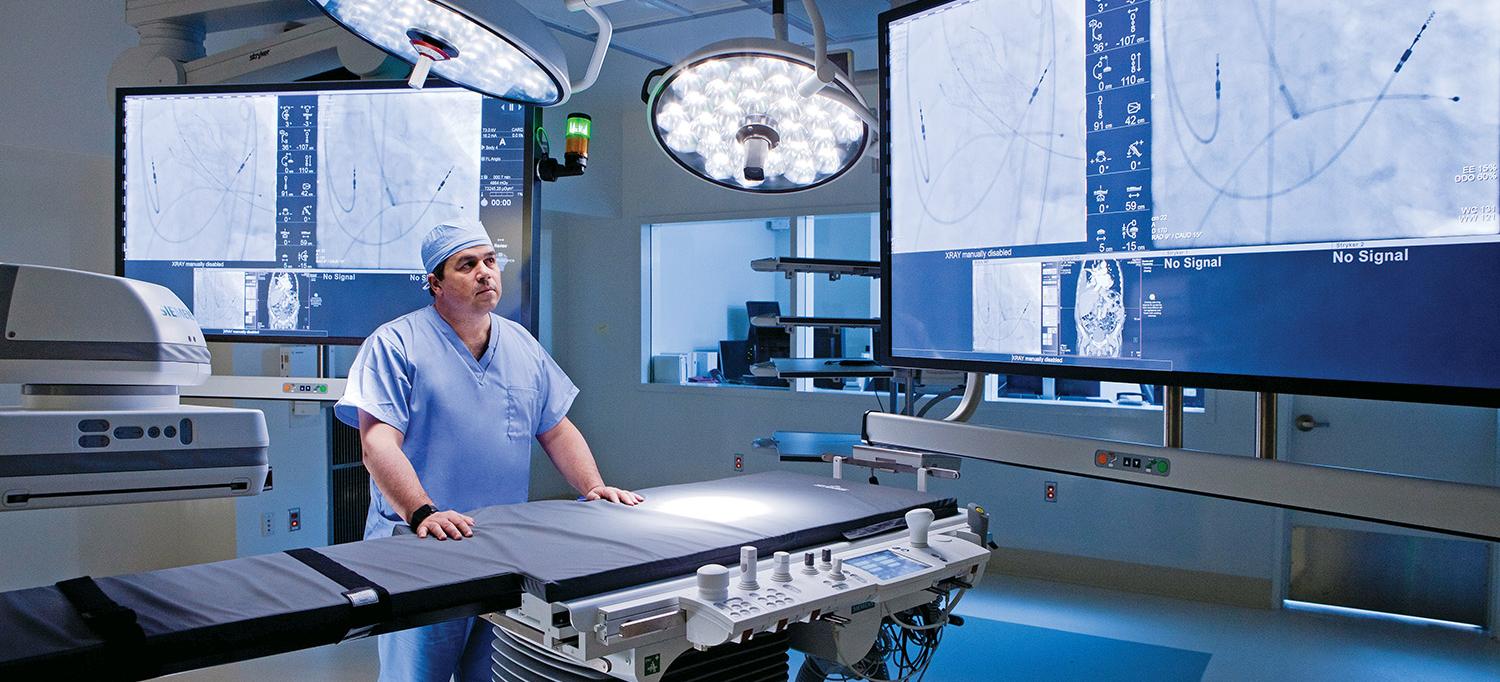 Dr. Mathew Williams Stands in Hybrid Operating Room