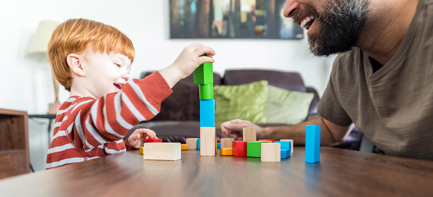 Father and Child Playing with Blocks