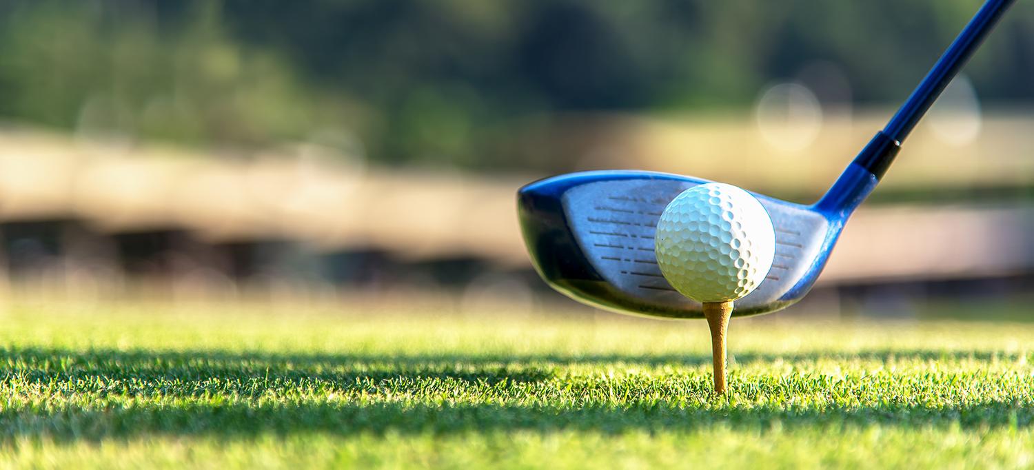 Golf Club and Teed Up Golf Ball