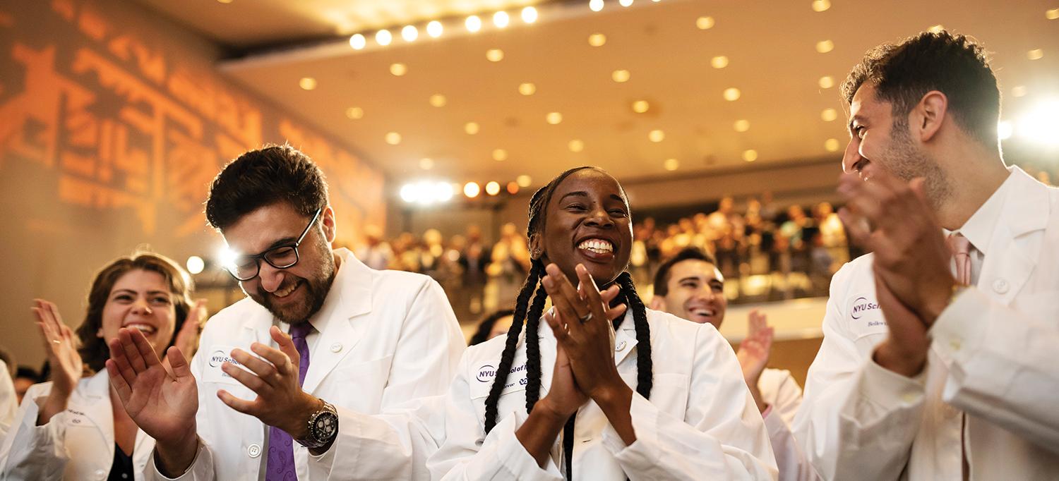 Students Applauding at White Coat Ceremony