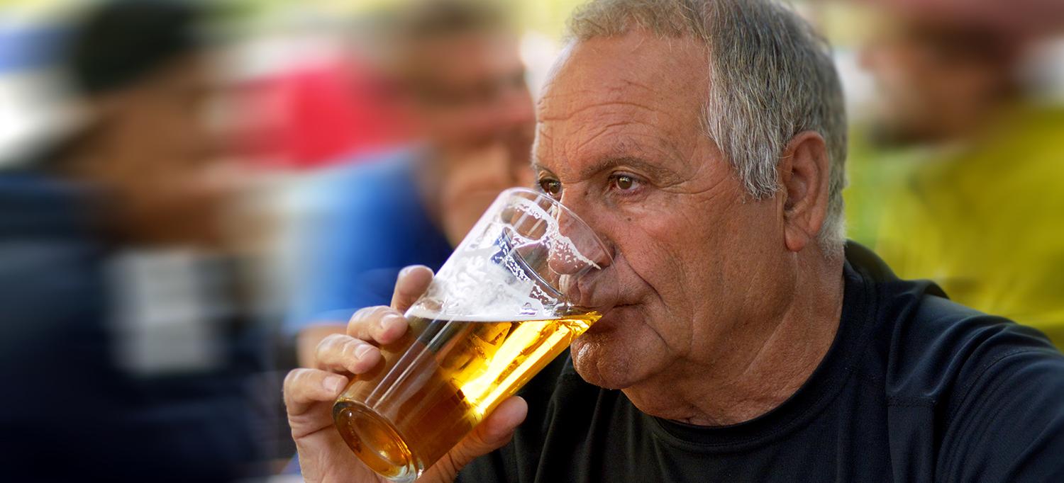 Middle-Aged Man Drinking Beer