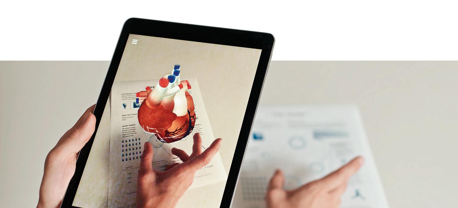 Person Views Heart on Tablet