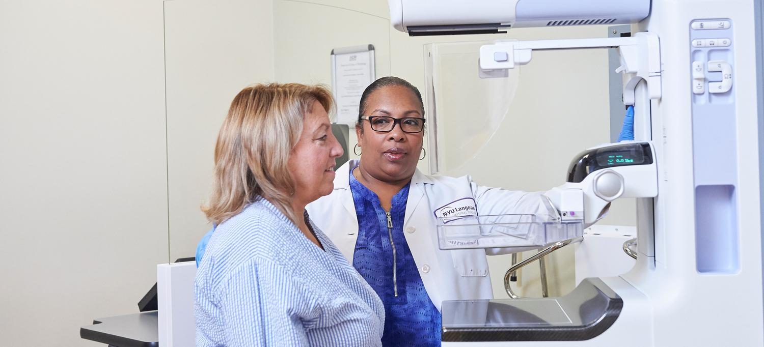 Mammogram Technician Preps Patient