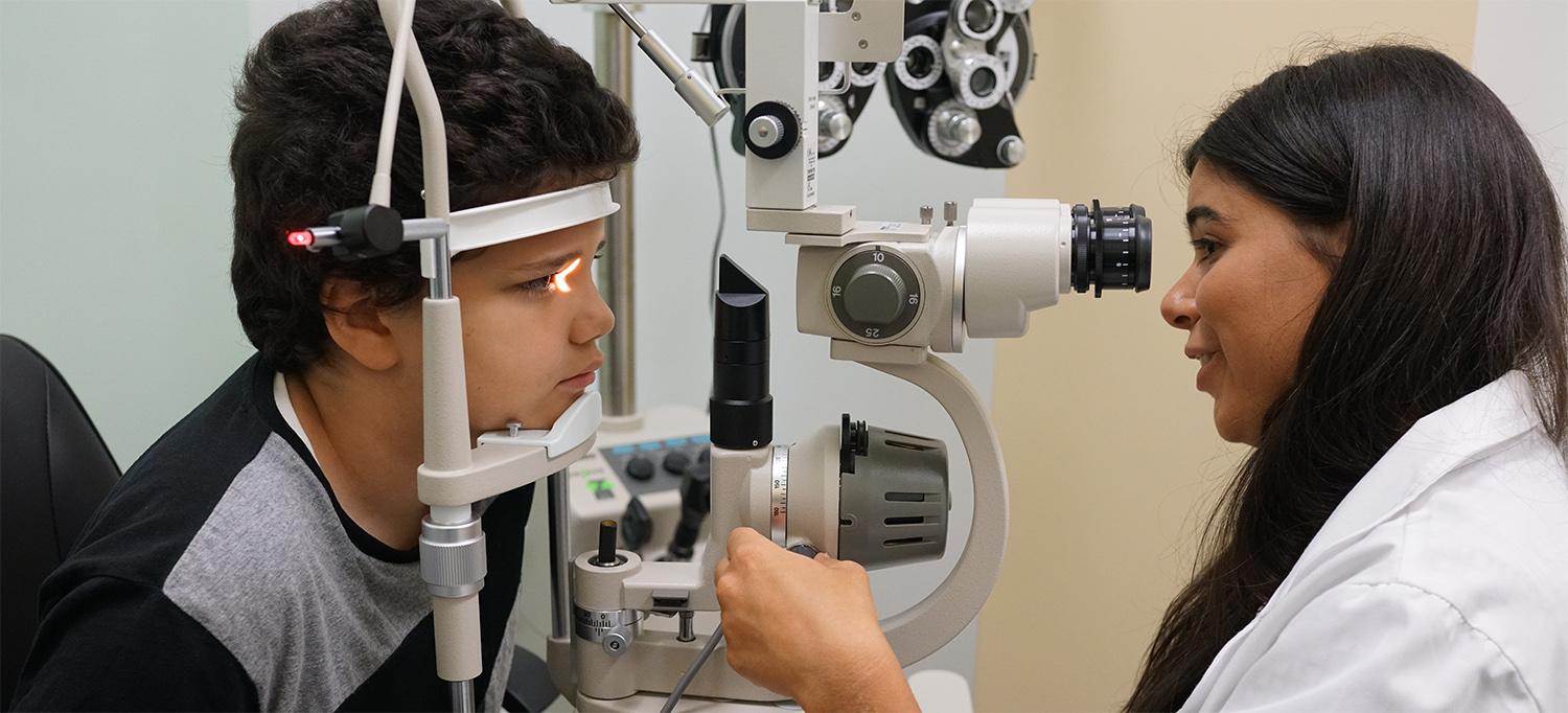 Optometrist Mary Botelho Performs an Eye Exam