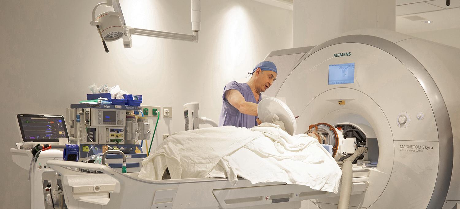 Neurosurgeon Dr. Alon Mogilner Monitors High-Intensity Focused Ultrasound Treatment