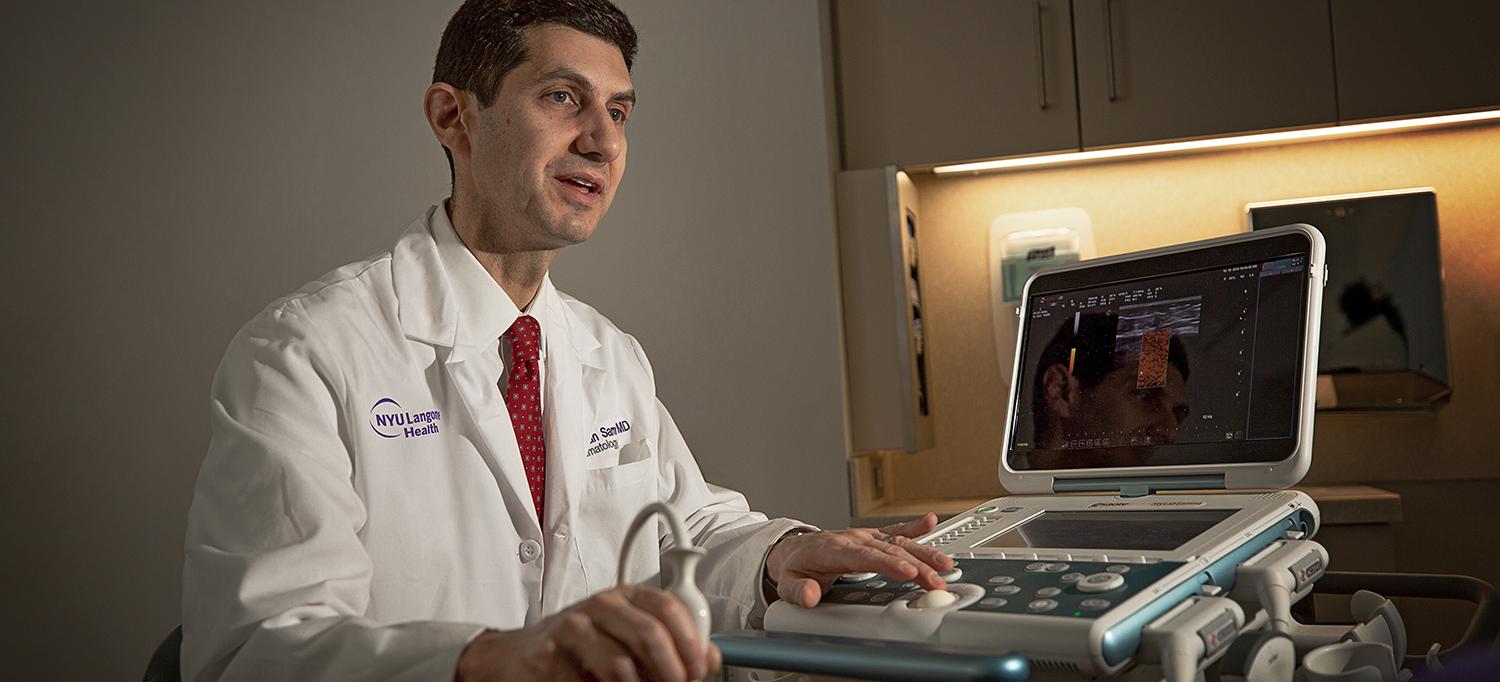 Dr. Jonathan Samuels Using an Ultrasound Machine