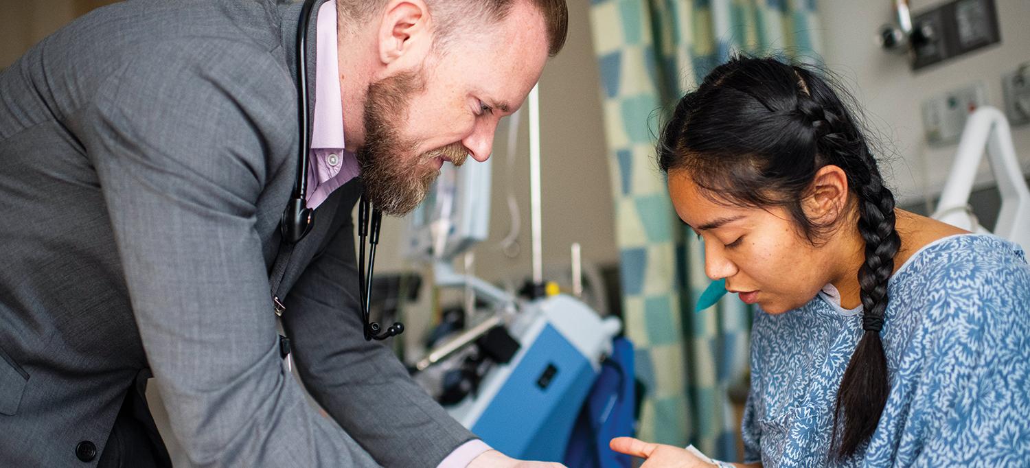 Dr. Aaron Lord Speaks with a Patient