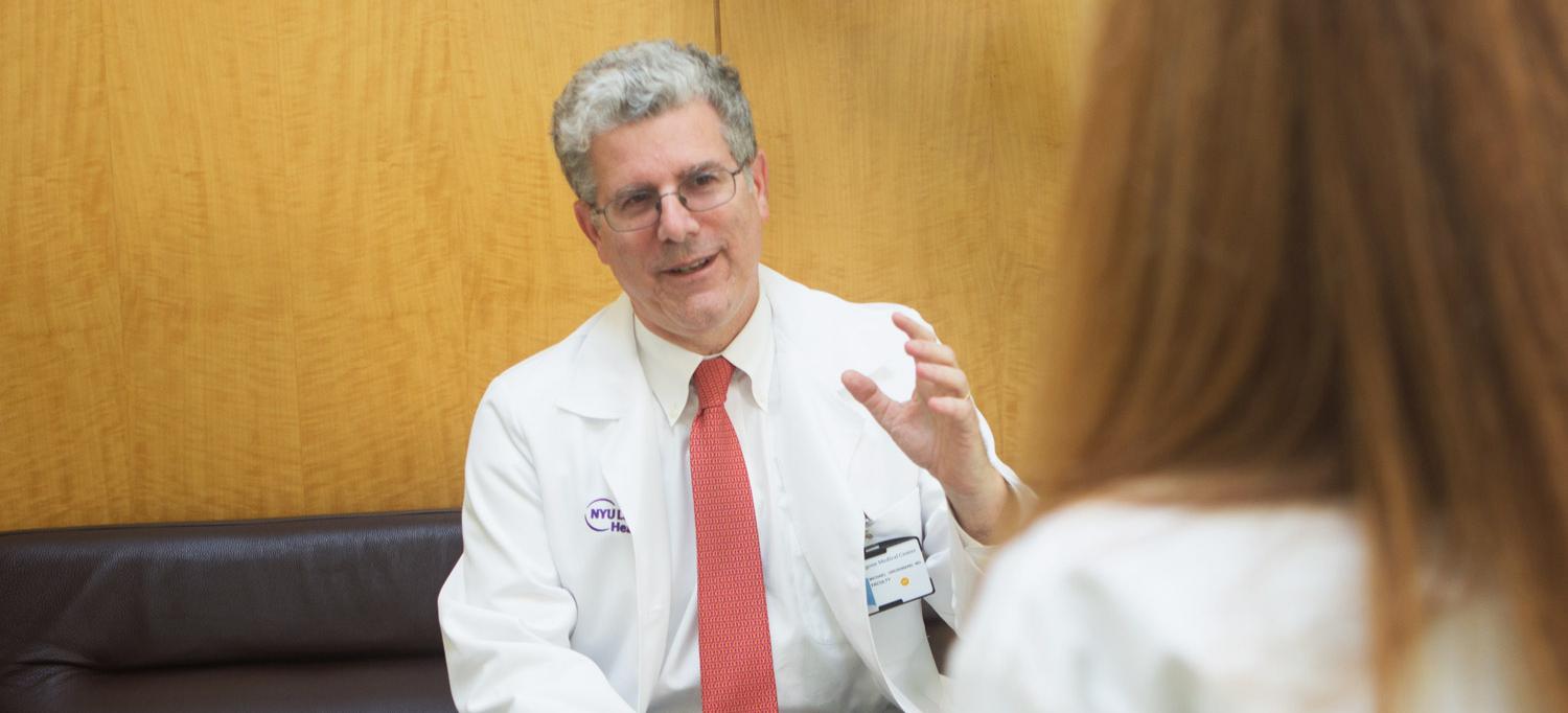 Dr. Michael L. Grossbard Talks with Patient
