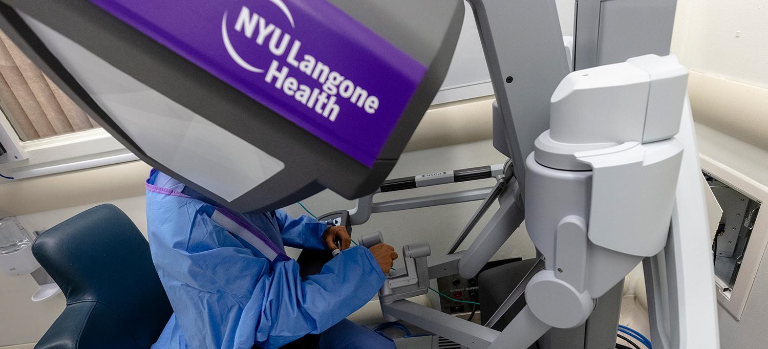 Doctor Using Robotic Surgery System