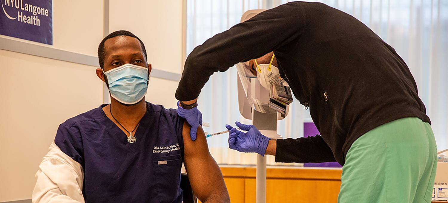 Dr. Olumide Akindutire Receives COVID-19 Vaccine