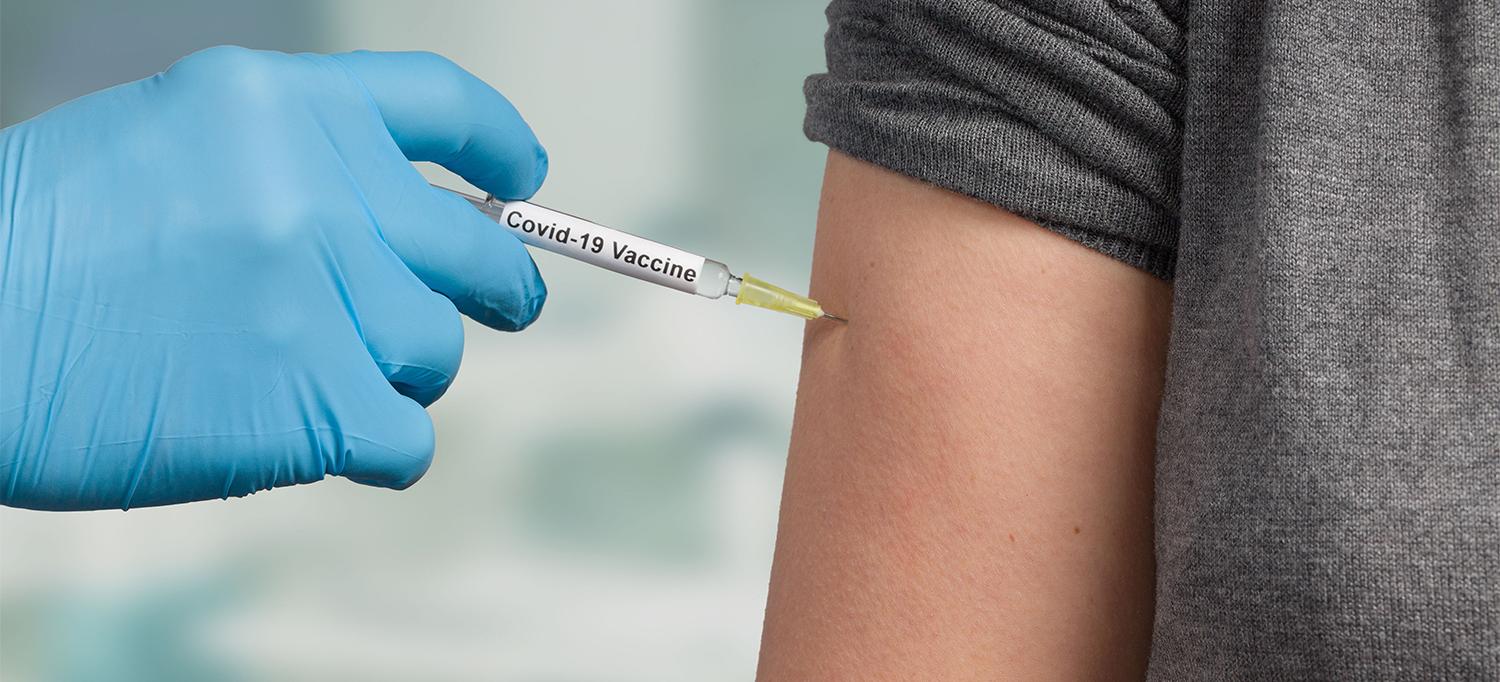 Person Receiving COVID-19 Vaccine