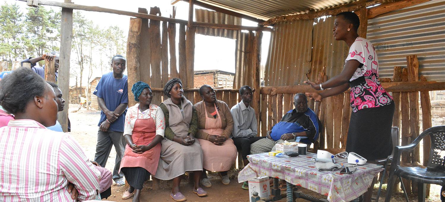 Community Worker with Locals in Kenya