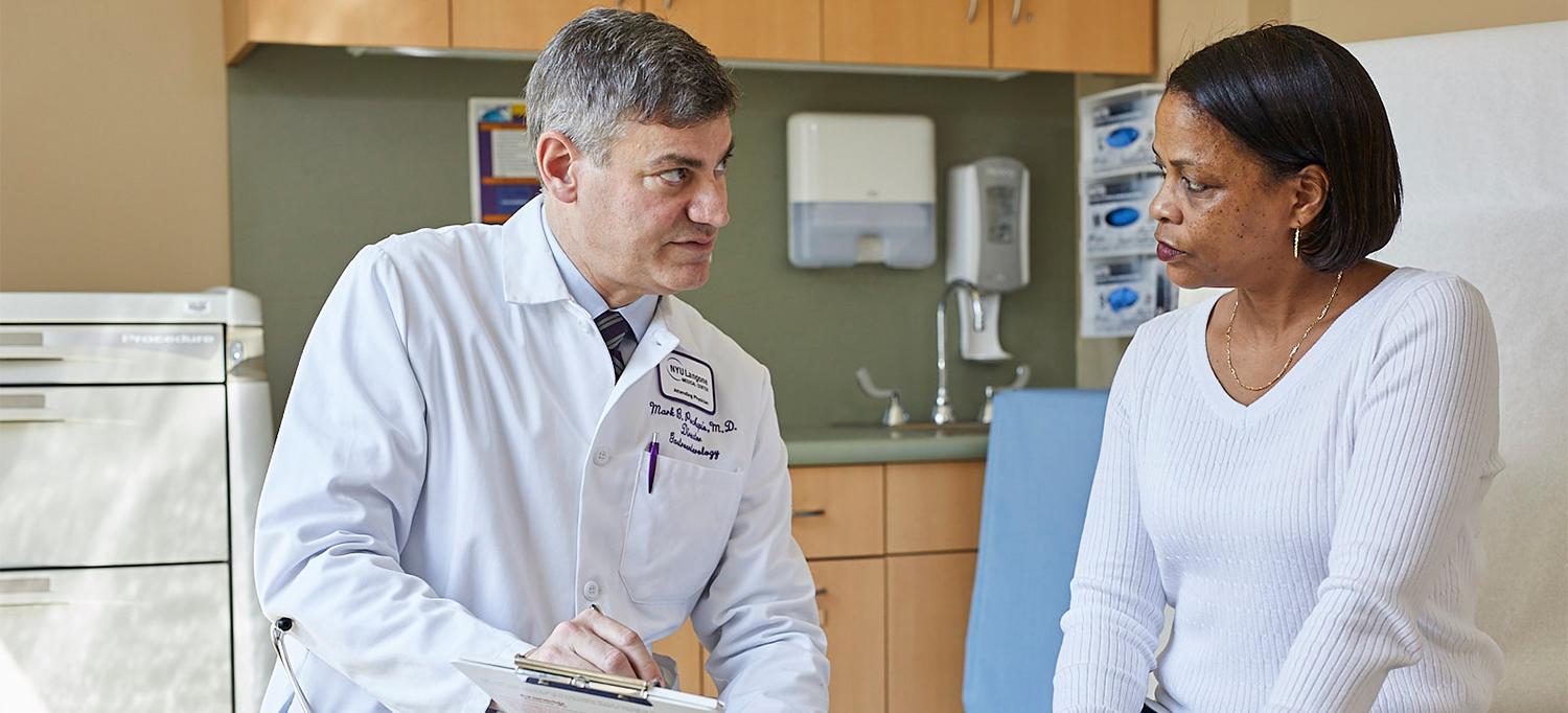 Dr. Mark B. Pochapin Speaking with Patient