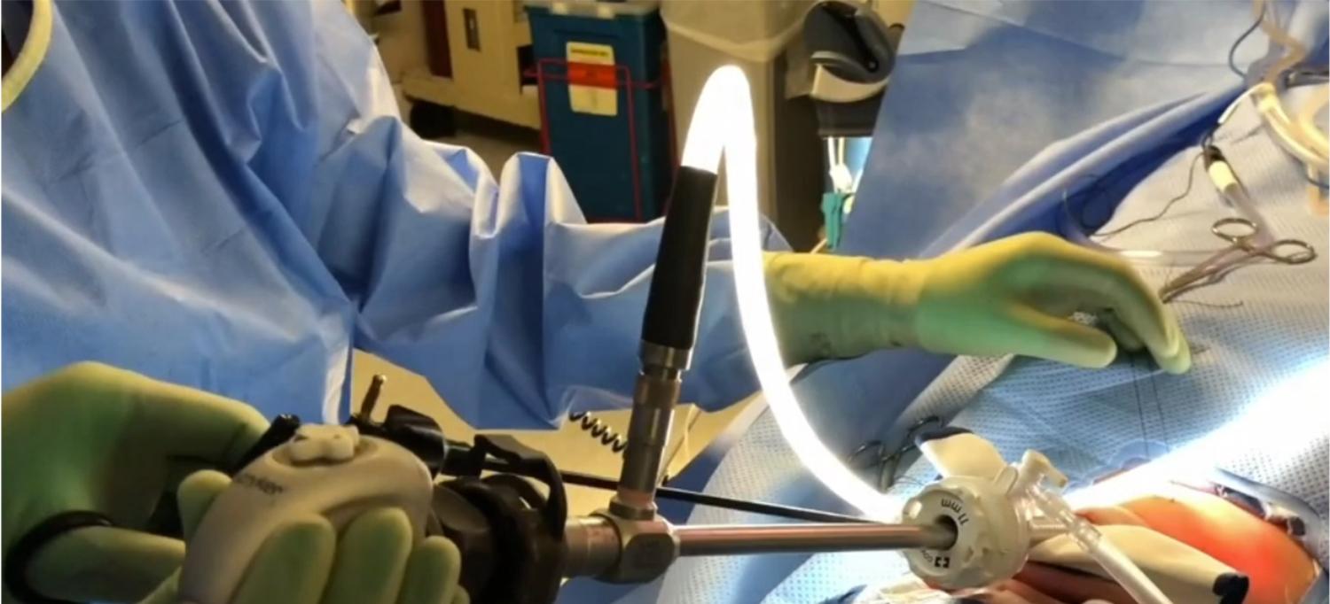 Surgeons Performing Transoral Thyroidectomy in Operating Room