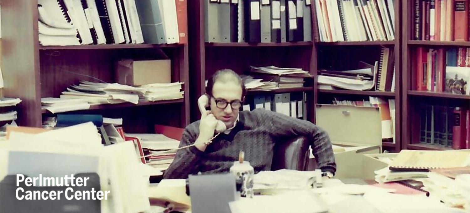 Dr. Franco M. Muggia Talking on Phone in His Office