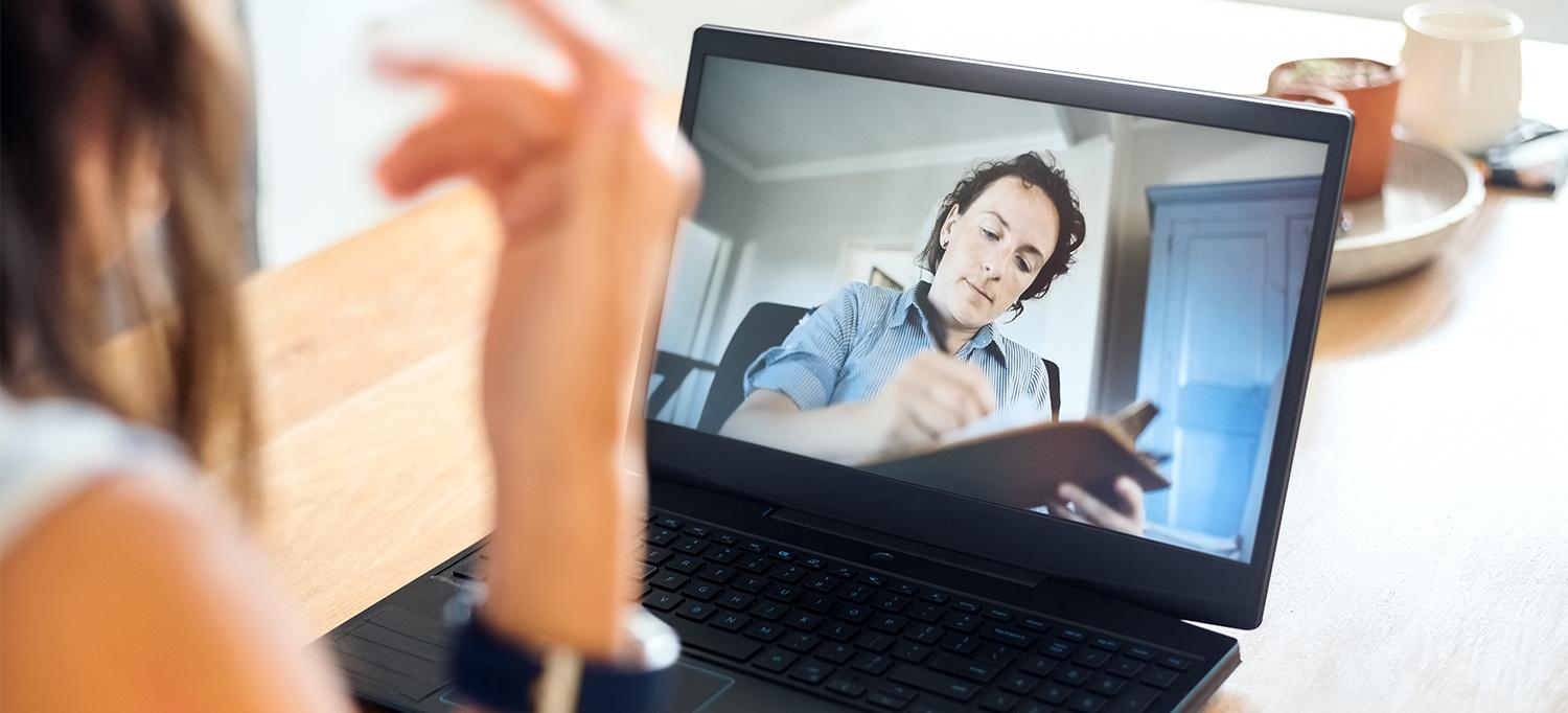 Person Having Virtual Therapy Session on Computer