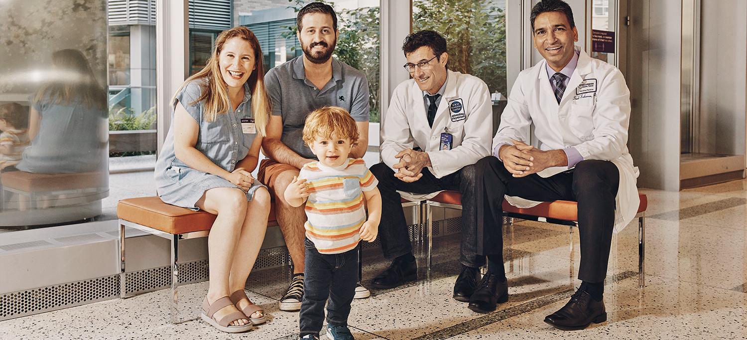 Ellen Gettinger, Jonathan Gettinger, Dr. Michael Argilla, and Dr. Sunil Saharan with 2-Year-Old Max Gettinger