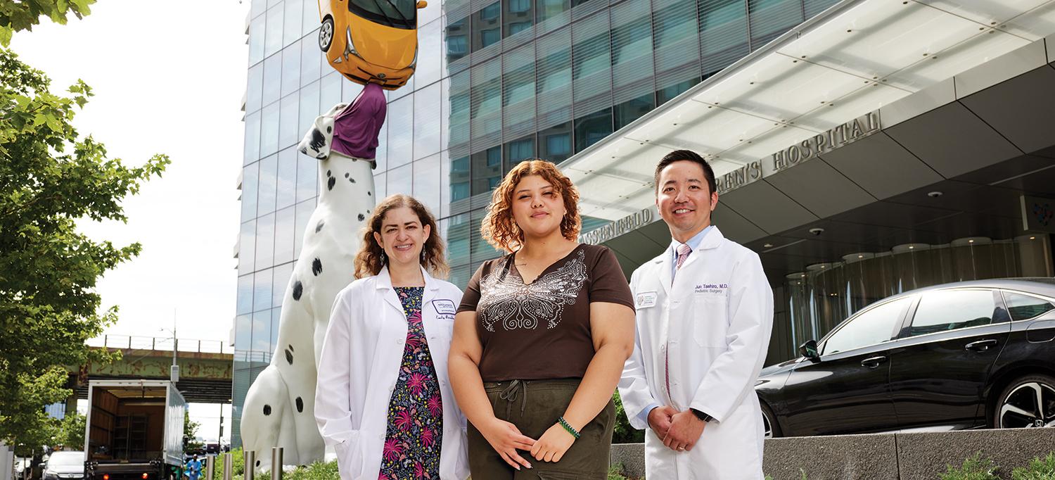 Dr. Emily Breidbart, Mariana Castrillon, and Dr. Jun Tashiro Standing Outside Hassenfeld Children’s Hospital