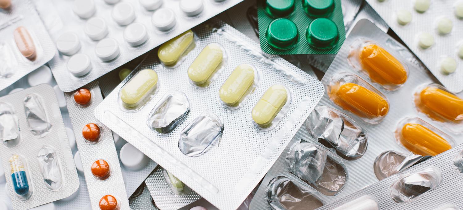 An array of pills in blister packs