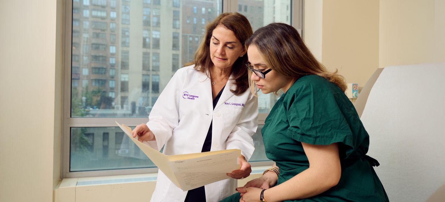 Dr. Mary L. Gemignani examines a patient during a follow-up visit.