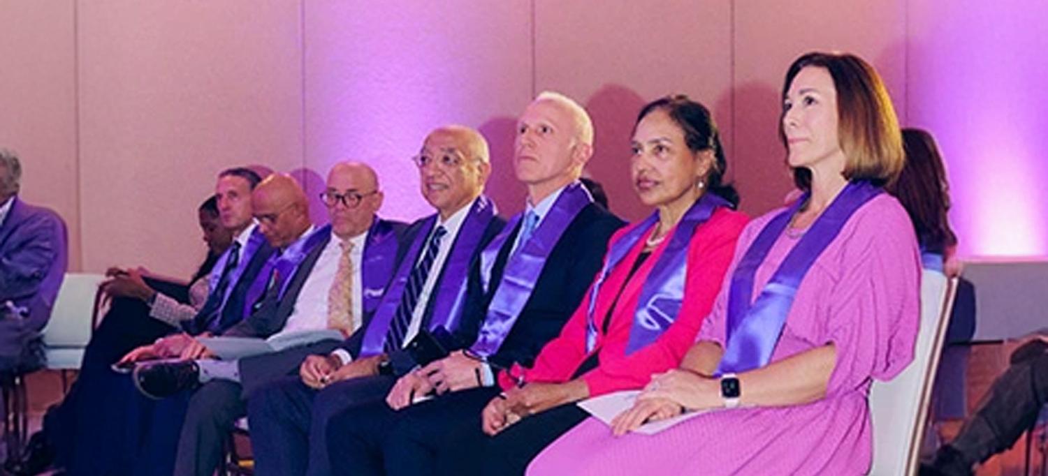 Participant on stage for Dean’s Honors Day 2025