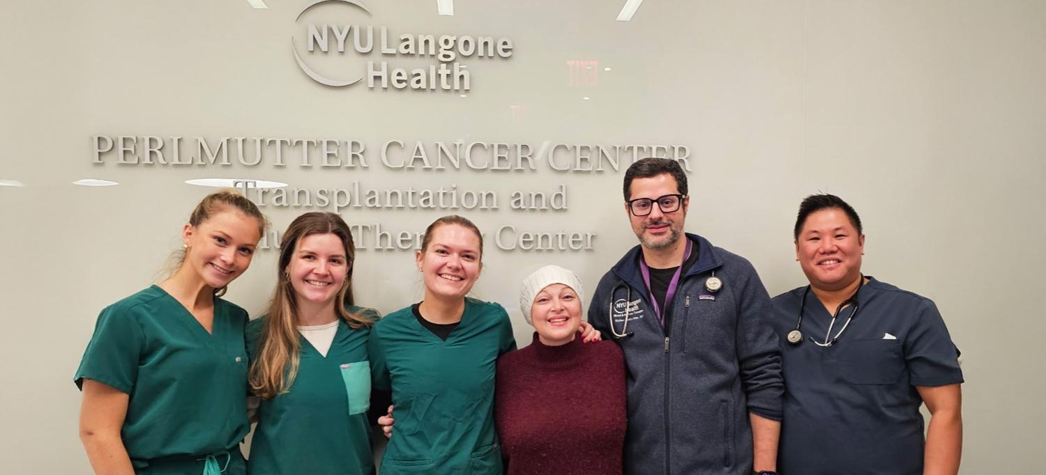 Allison Carballo poses with her medical team 