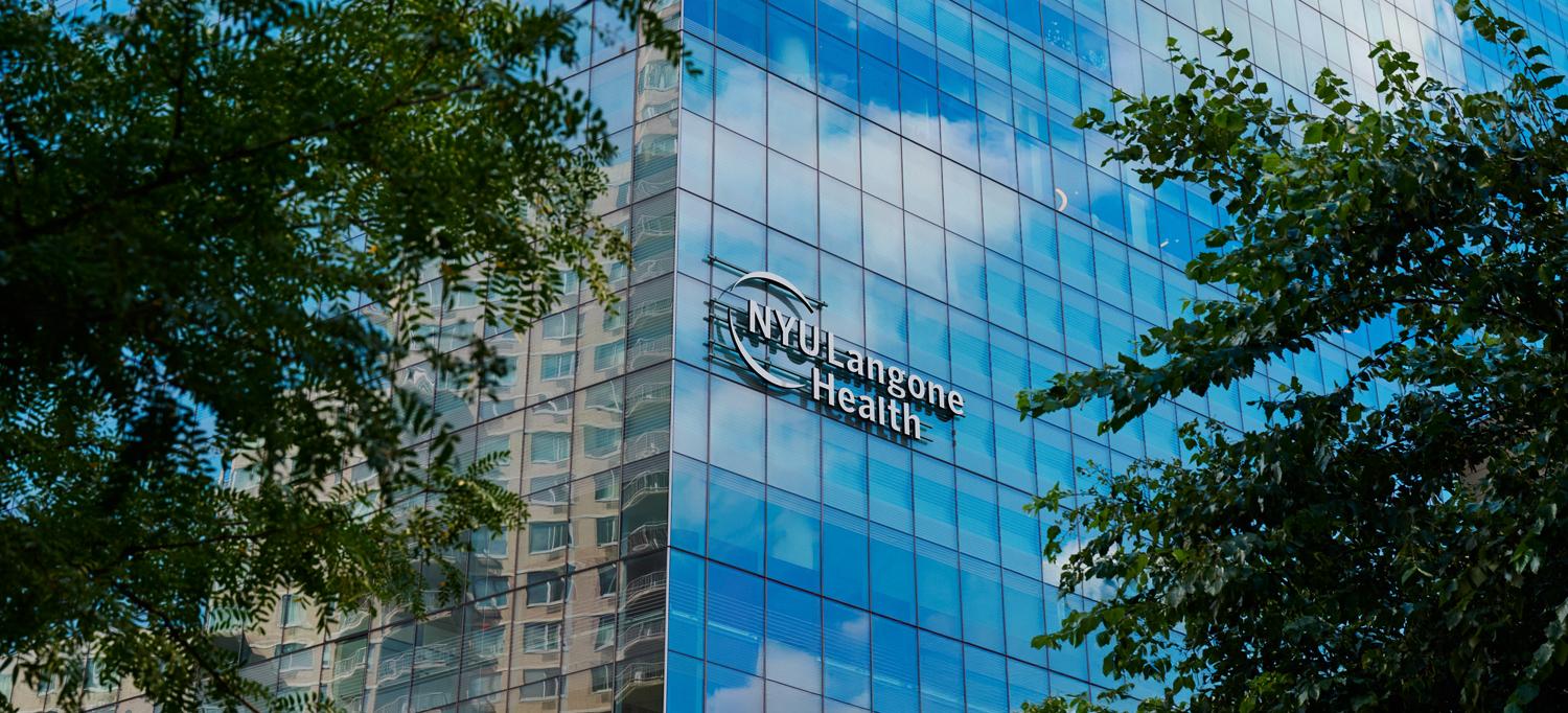 Exterior view of a building with NYU Langone Health logo.