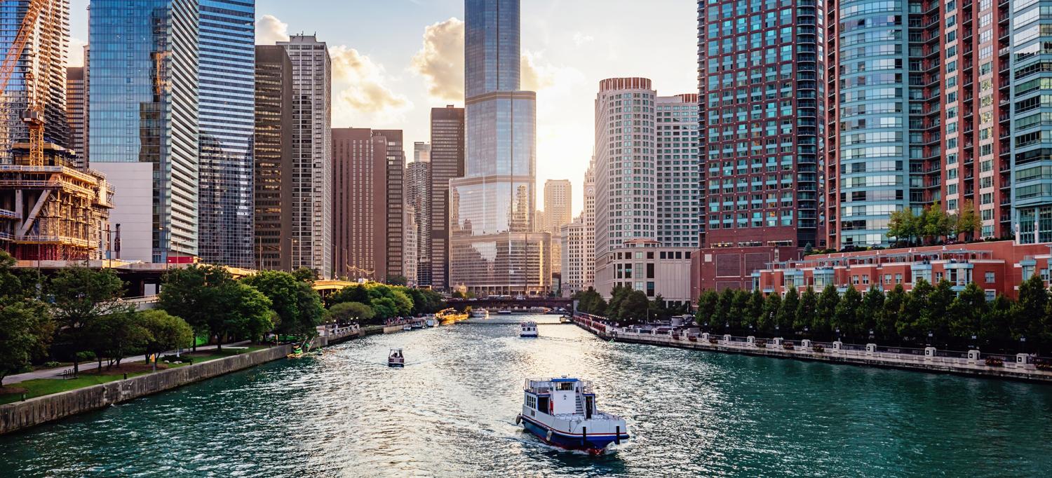 Chicago River cityscape at sunset
