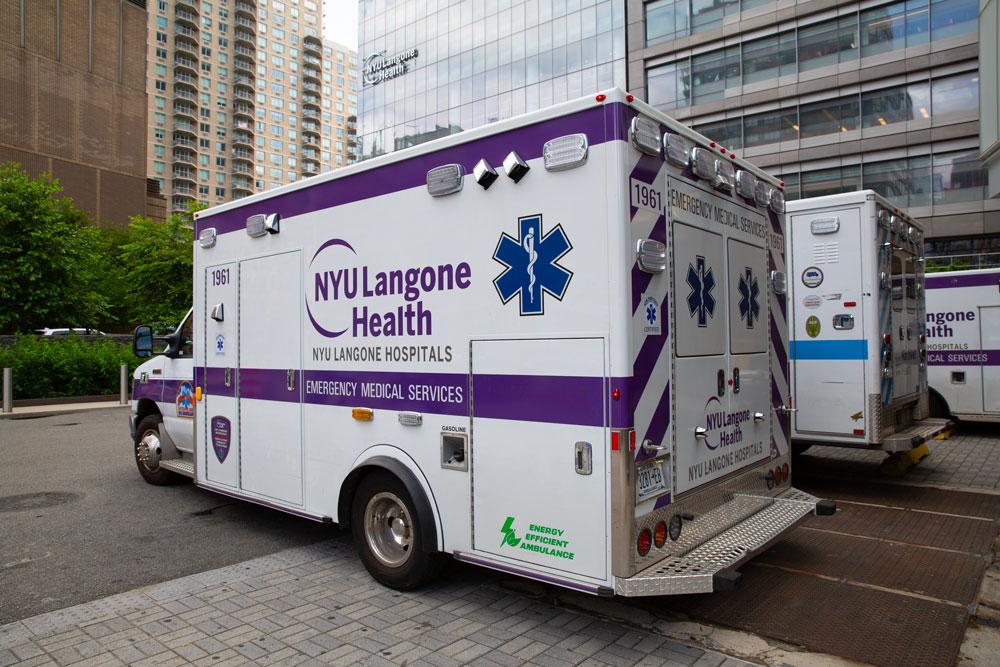 An ambulance with NYU Langone’s logo on its side