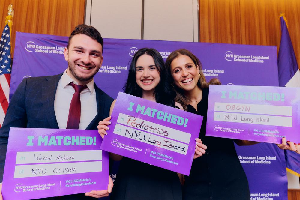 Three students celebrate their residency matches.