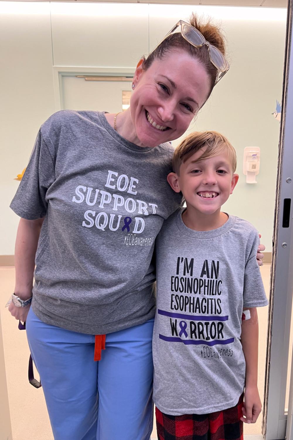 Dr. Greifer and Logan standing next to each other smiling.
