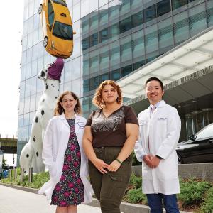 Dr. Emily Breidbart, Mariana Castrillon, and Dr. Jun Tashiro Standing Outside Hassenfeld Children’s Hospital