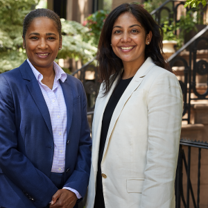 Dr. Donna-Marie Manasseh and Dr. Nina D’Abreo standing in Cobble Hill neighborhood