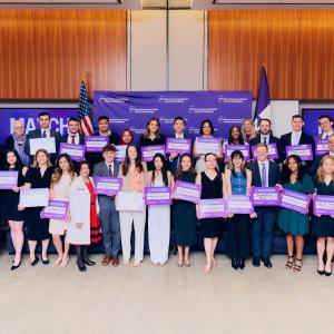 Soon-to-be graduates celebrate their residency matches with faculty members and the dean.