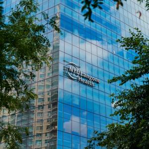 Exterior view of a building with NYU Langone Health logo.