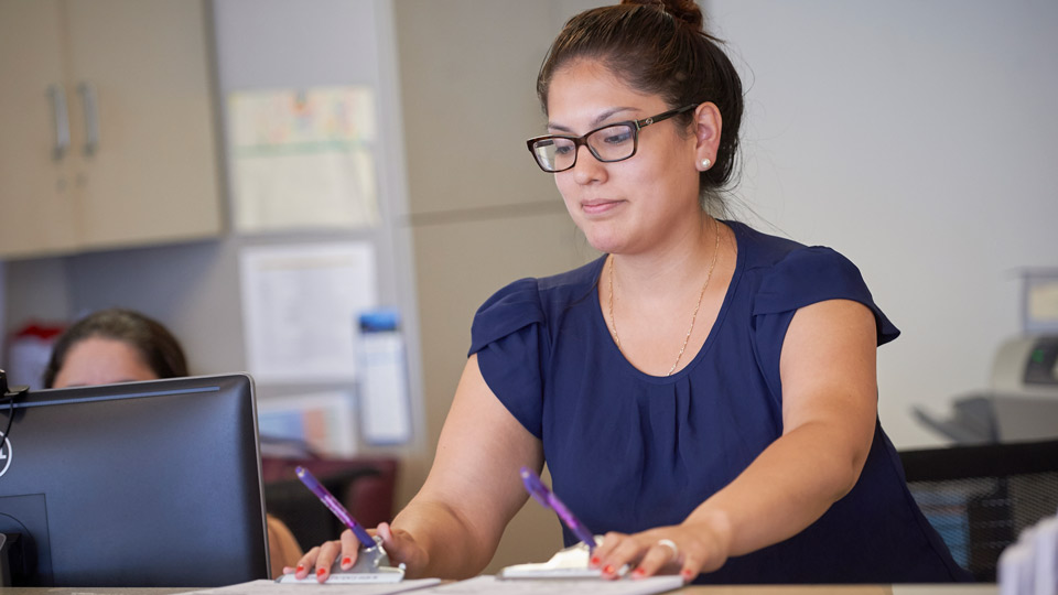 Patient Coordinator Filing Paperwork